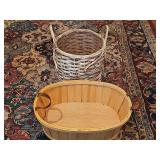 Two decorative baskets. Oval is 22 x 15 x 7 in tall. Round is 13.5 x 13 in tall not including handles.