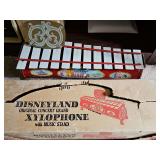 Vintage 1950s-60s Tudor Metal Products "Disneyland Original Concert Grand" xylophone toy with original box. Middle C and D keys are loose, missing mallet.