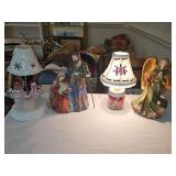 Lighted figurines, candle holder, and very small lamp. Mary Joseph and jesus, an angel, three acrylic snowmen that is a candle holder, and a one cup green mason jar that