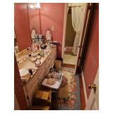 Contents of hallway bathroom. Includes sewing goods, handheld mirrors, towels, and more. See all photos. Does not include closet.