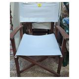 4 folding wood frame captains chairs with duck cloth canvas seat and back. 22x19x34 in tall. Seat height 17 in tall.