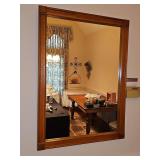 Wood framed hanging mirror. 32 x 44 in tall.