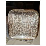 Mid-century modern serving tray by WMF Ikora. German silver-plated or brass-toned dish from the 1960s, featuring a distinctive machine-swirl or engine-turned brushed texture with scalloped borders.