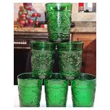 Set of 6 vintage Anchor Hocking forest green water glasses in the pressed "Sandwich" pattern, featuring an embossed floral and stippled texture design produced during the mid-20th century.