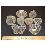 Grouping of crystal and glass trinket boxes.