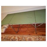 folding metal table with 15-in drop leaf sides on each end. 60 x 24 x 28 in tall as shown in first photo.