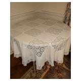 Round 40 inch folding table with table scarf.