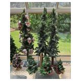 Grouping of artificial trees and angel tree toppers. Taller trees are 36 in tall and need to be fluffed out.