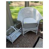White wicker tub arm chair with tall cushion. 28x19x32 in tall. Seat height 20 in. Also includes a wicker magazine rack. 17.5x11.5x17 in tall.