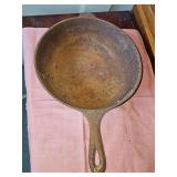 10 inch cast iron chicken fryer. 3 in deep. Needs rust cleared and re-seasoned.