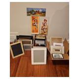 Three containers of picture frames.