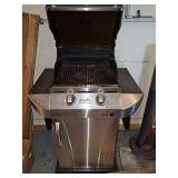 Char-Broil Infrared quantum gas grill. Includes cover and has a propane tank inside. Exterior dimensions are 30.5 x 24 x 46 in tall at rear of grill. Grill surface is 17.5 in wide x 17 in deep.