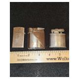 Three lighters. Left to right is zippo, ronson, ronson. Appear operational. However no fluid to test
