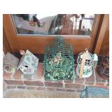 Decorative bird cages and bird houses.