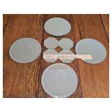 Eight collectibles display mirrors. Four octagon and four round.