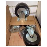 NIB - both boxes contain a set of (4) casters with hardware