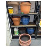 3 shelves of planters - various sizes and materials