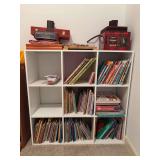 Cubical unit and contents of books and games - 36 x 11-1/2 x 36 tall