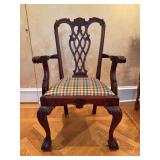 Traditional Chippendale-style mahogany armchair featuring an intricate ribbon-back design and a colorful plaid upholstered seat - 24-1/2 x 17 x 19-1/2 tall to seat (41-1/4 tall overall)