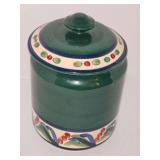 Gail Pittman canister jar. Flea bite/chip on rim and lid. 5x8.25 in tall.