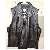 Apt. 9 black lambskin leather vest with front zipper. Size large in very good condition.