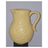 Bordallo Pinheiro yellow pitcher from Portugal featuring charming embossed bunnies. 7.5 in tall.