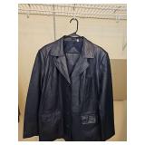 Preston & York black lambskin leather button front jacket with collar, lapels, and three front pockets. Size XL in very good condition.