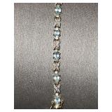 Sterling bracelet/gold overlay with blue and tiny clear stone chips. 7 1/2 in.