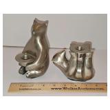 Two Restoration Hardware arctic bear taper candleholders with brushed silvertone metal finish. Adorable!