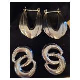 Two pair of sterling silver earrings weighing 12.2 g.