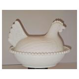 White milk glass hen on nest. 7x5.5 x 5.5 in tall. One chip on lid found as shown.