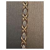 Gold overlay on sterling bracelet with clear stone chips. 7 1/2 in.