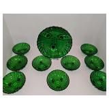 Anchor Hocking forest green glass footed salad serving bowl with 9 salad bowls featuring an embossed bubble-dot and scalloped shell pattern. Serving bowl is 8.5 in, individual bowls are 4.5 in.