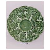 Bordallo Pinheiro green Majolica cabbage-leaf chip-and-dip serving platter featuring an integrated center bowl and textured leaf veining. 12.25-in diameter.