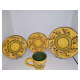 HD Designs dinnerware. Four dinner plates, four bowls, seven salad/sandwich plates, 12 mugs.