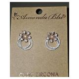 Amanda Blu CZ earrings. According to their website all of their jewelry is gold-dipped or sterling silver-dipped with added palladium layers to protect the finish.
