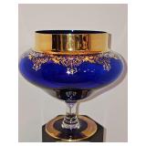 Mid century cobalt blue and gold-gilt Italian style footed glass compote or candy dish. 6-in diameter at a widest point x 6.25 in tall