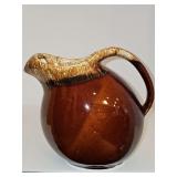 Hull oven proof brown drip glaze ball pitcher with ice-lip spout.