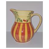 Gail Pittman pouring pitcher. 7.5 in tall. Picture has no damage that I found. White spots are the flash reflecting from the photograph.