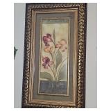 Nicely framed and double matted floral art print featuring purple and yellow blossoms in an ornate, dark gold-toned decorative wood frame.