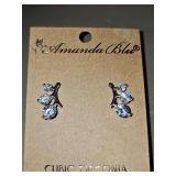 Amanda Blu CZ earrings. According to their website all of their jewelry is gold-dipped or sterling silver-dipped with added palladium layers to protect the finish.