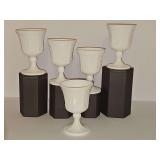 Five Indiana Glass Colony Harvest milk glass goblets with an embossed grape and vine pattern. 5.25 in tall.