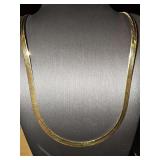 14K yellow gold serpentine chain. 24 in weighing 12.3 g.