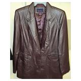 Denim & Co dark brown leather hip length jacket with one button and two front pockets. Size large. Very good condition.