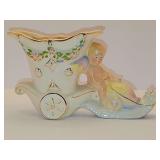 The Snail Driver, mid-century ceramic decorative pot that features a cherub or angel riding a cart pulled by a snail. 8x4.75 in tall.