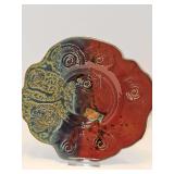 Brant Barnes pottery plate. Artist signed. 9.5 in diameter.