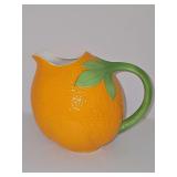 Orange fruit pouring pitcher. 6 in tall