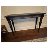 Distressed look table. 47.5 x 15.75x 33 in tall.