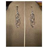 Sterling silver earrings and 7-in sterling silver bracelet.