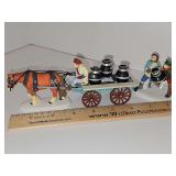 Dept 56 Heritage Village collection, New England Village series, A NEW POT-BELLIED STOVE FOR CHRISTMAS. Set of two pieces. Retired 1998.